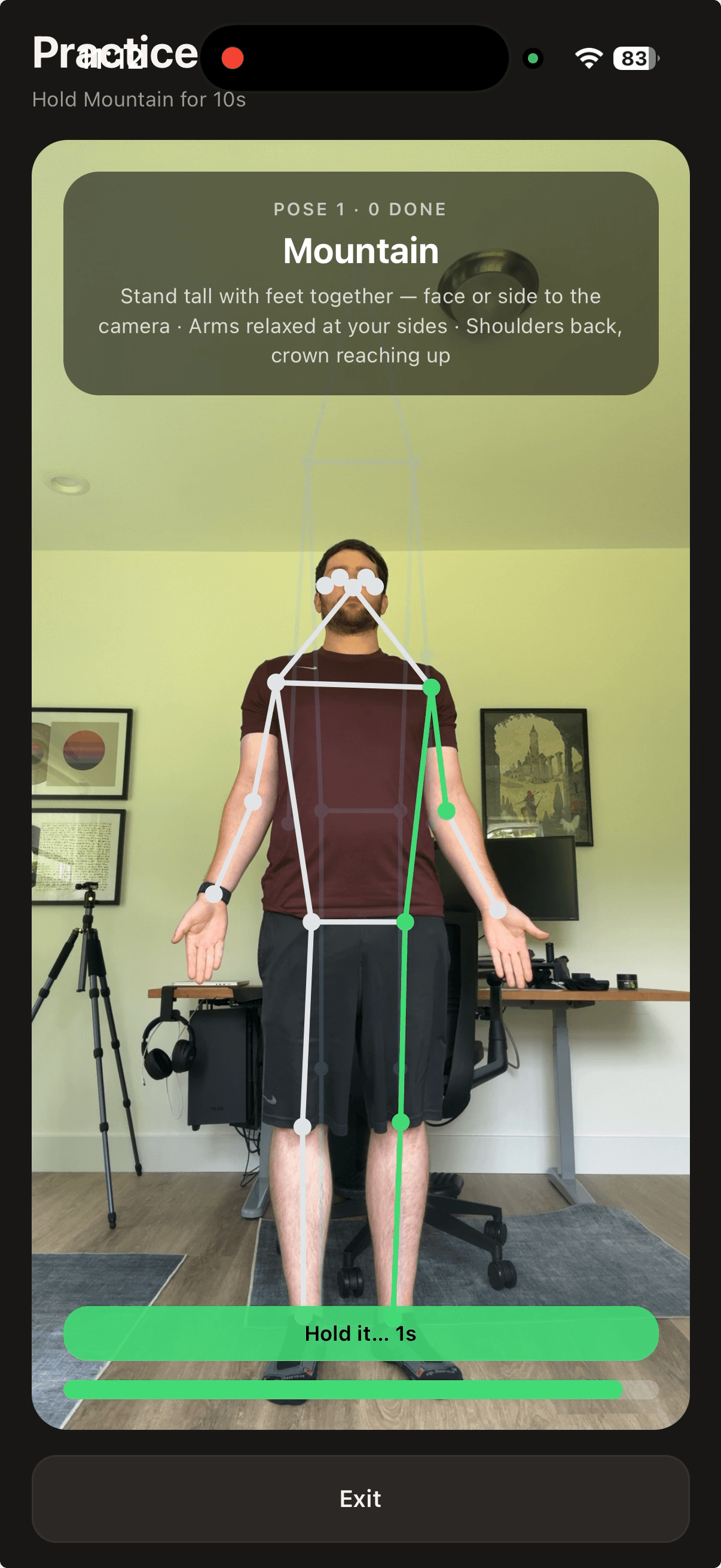 Yogalarm practice screen with live pose tracking